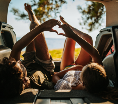 couple sitting back inside vehicle